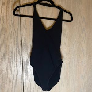 Black halter body suit